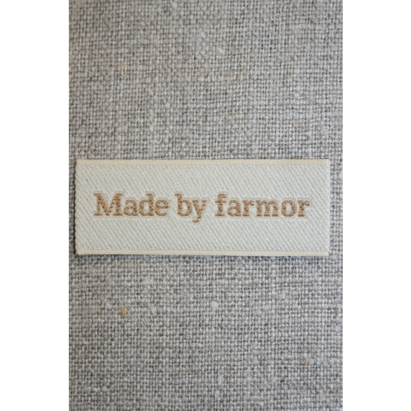 Beige mærke - label "Made by farmor"