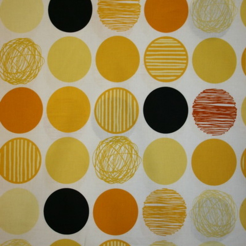 Patchwork stof i gul, carry og sort med cirkler