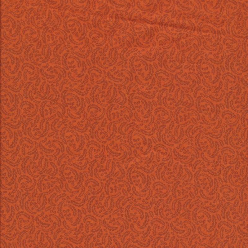 Patchwork stof i orange med små blade