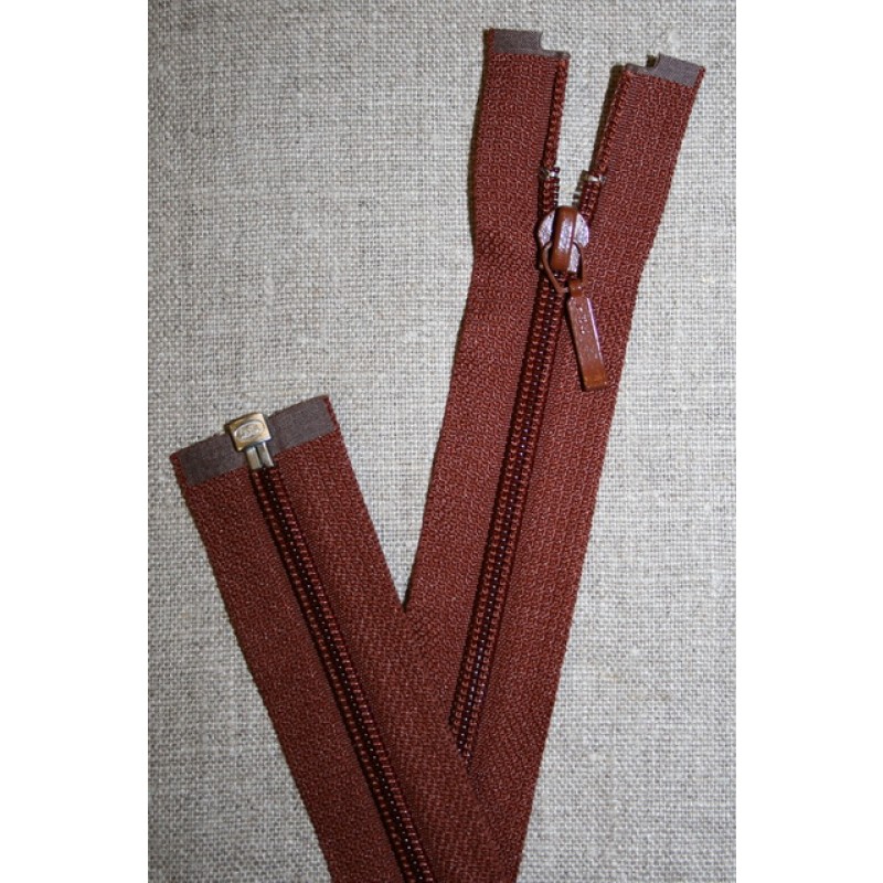 27 cm. delbar lynlås YKK, rød-brun