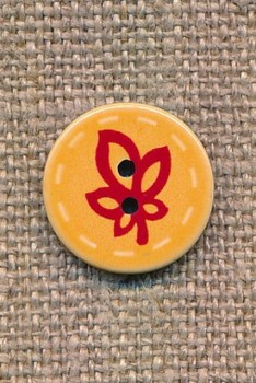 Knap med blad i støvet gul og rød, 15 mm.