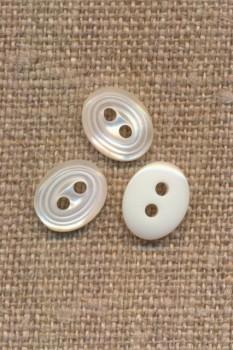 Lille oval off-white knap med ringe i kanten 9x11 mm.