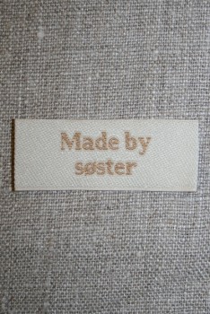 Beige mærke - label "Made by søster"