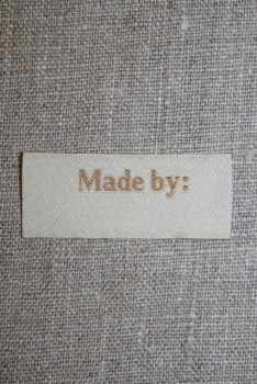 Beige mærke - label "Made by"