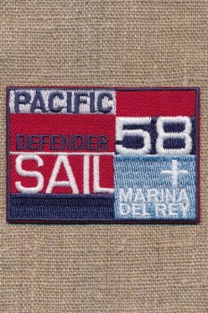Strygemærke i rød blå denim "Pacific Defender Sail"