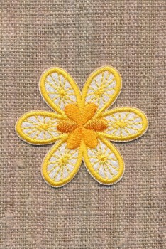 Motiv med blomst i gul og hvid