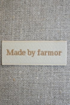 Beige mærke "Made by farmor"