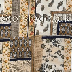 Let 100% viscosesatin med patchwork mønster i gylden, brun og beige.