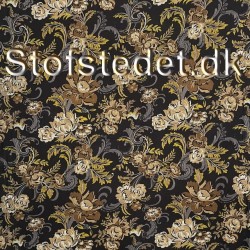 Viscose jersey med blomster og blade i sort, okker, grå og brun.