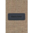 Motiv- label i læderlook i grå "Made by Farmor"