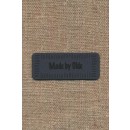 Motiv- label i læderlook i grå "Made by Olde"