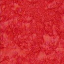 Afklip Patchworkstof batik i rød og koral 50x55 cm.