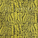 Afklip Patchwork stof med blad print i sort og gul- Kaffe Fassett, 50x55 cm.
