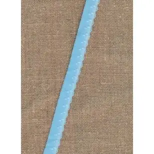 Foldeelastik med buet kant og prik, lyseblå - Foldeelastik, foldebånd, uldbånd