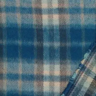 Ternet uld/polyester i petrol brun offwhite - Uld