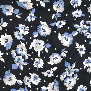 Quiltet stof i sort med blomster i blå, grå, hvid - Quilt