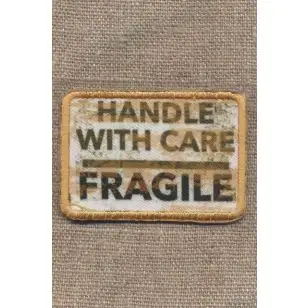 Motiv Handle with care - Fragile - Pige
