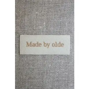 Beige mærke - label "Made by olde" - Diverse mærker